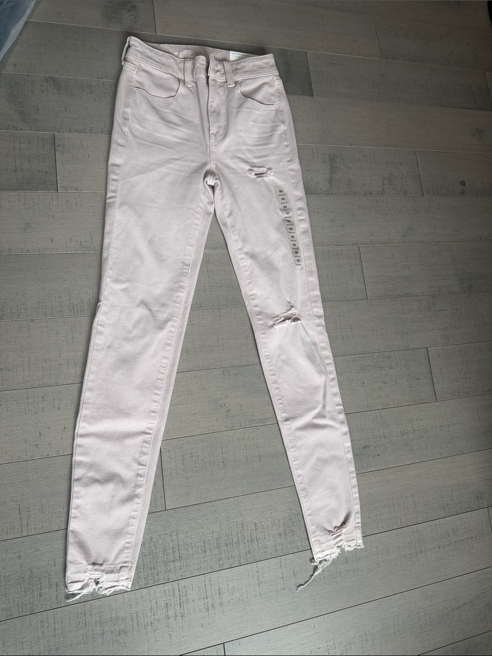 American Eagle Outfitters Light Pink Distressed Skinny Jeans